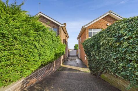 Driveway leading to Garage