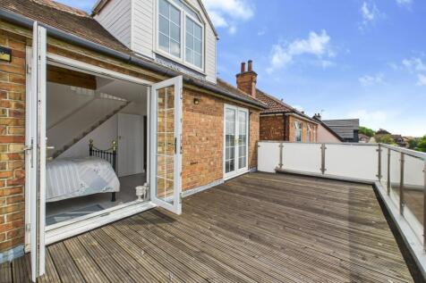 French doors from Bedroom One onto Balcony