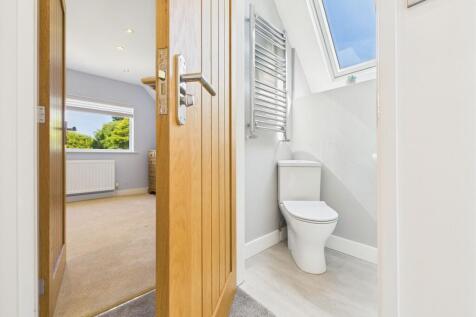 Wc and Bedroom One