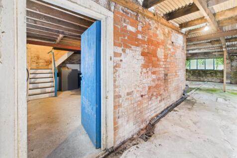 Garage Entrance through to Inner Hallway