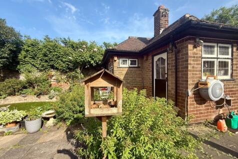 Rear garden/Gardener¿s cottage