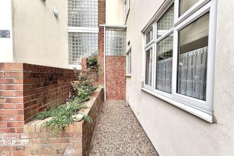 ENTRANCE/SMALL GARDEN AREA
