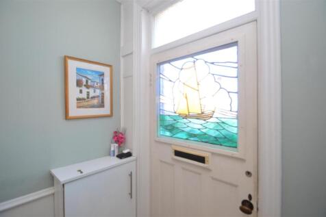 Hallway with original stain glass door
