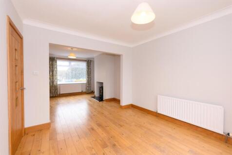 THROUGH LOUNGE/DINING ROOM