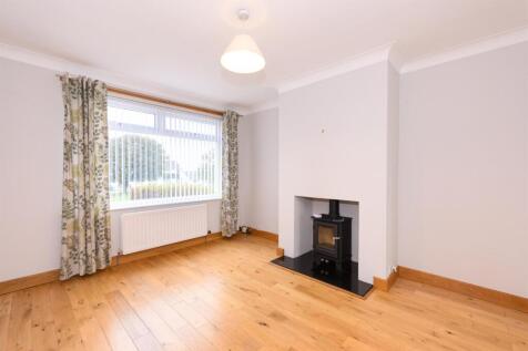 THROUGH LOUNGE/DINING ROOM