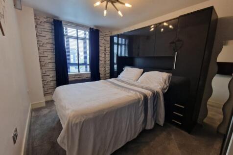 main bedroom with lights on
