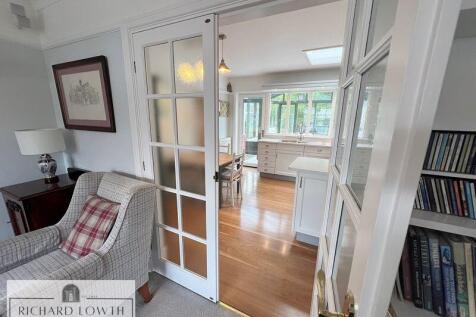 Lounge Opening into Kitchen