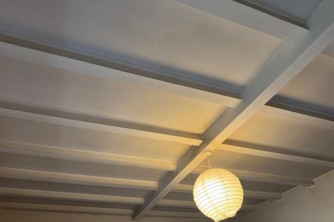 beamed ceiling in...