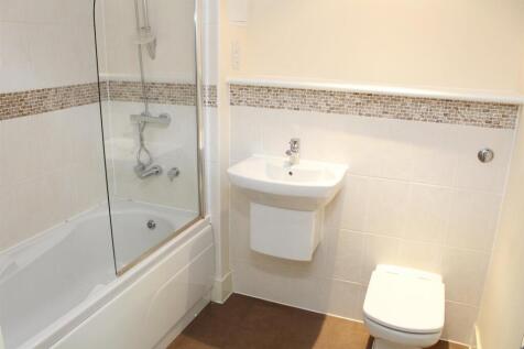 Bathroom with shower over bath