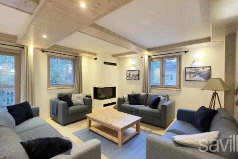 Living room renovated chalet Courchevel La Tania