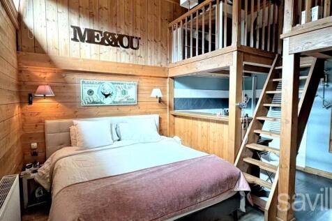 Bedroom with mezzanine apartment Courchevel Morion