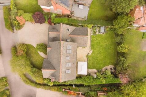 Suburban Garden Oasis with Tiled Roof.jpg