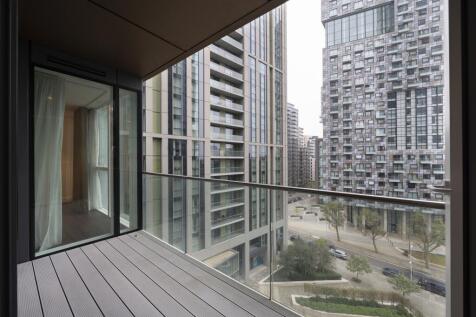 Experience breathtaking urban views from your sleek and contemporary balcony.