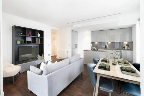 Experience elegance in this stylish open-plan living and kitchen space, designed for modern comfort.