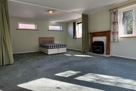 LIVING ROOM/BEDROOM FOUR: