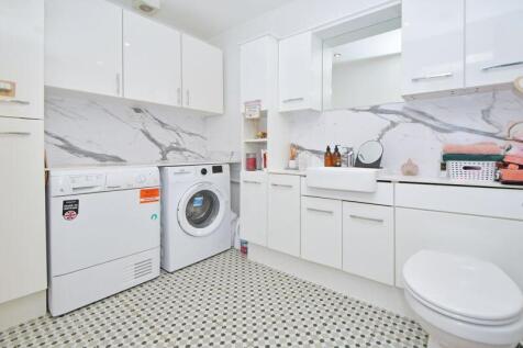 DOWNSTAIRS UTILITY/CLOAKS WC