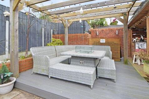 GARDEN DECKED PATIO AREA
