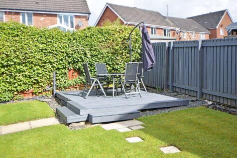 DECKED PATIO AREA
