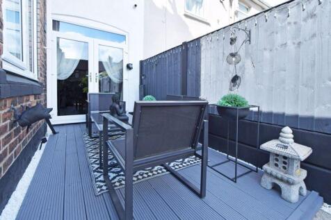 DECKED PATIO AREA