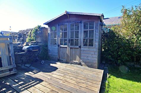 Decked Patio and Summerhouse