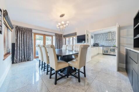 The superb Dining Room is the perfect space to ent