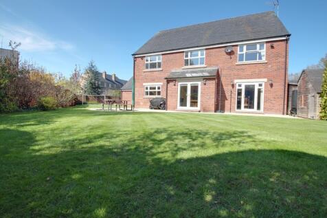 Part of the rear garden and view of the back of th