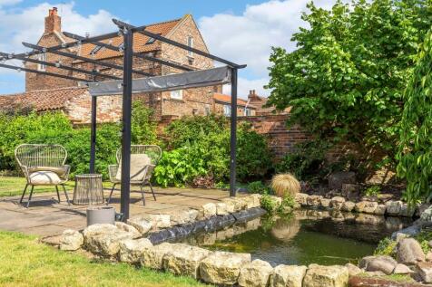Garden Patio Area And Pond