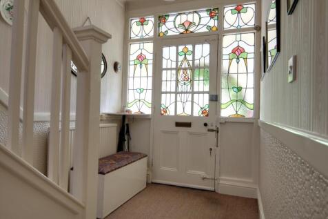 Lovely leaded and stained glass front entrance in 