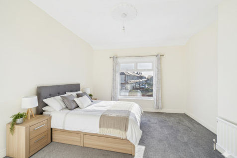 Enhanced with furniture to show how the room could