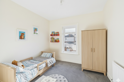 Enhanced with furniture to show how the room could