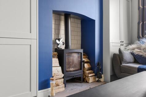 Wood Burning Fireplace In Lounge