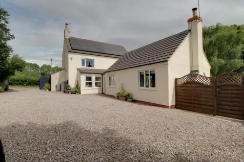 Side View of Property and Driveway