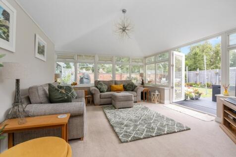 Family room with doors leading to the garden