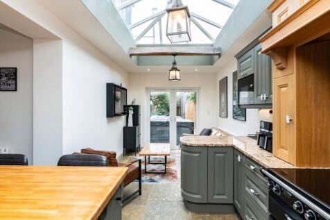 Sunlit kitchen and seating area