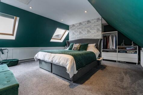 Light and airy this bedroom is perfect to relax in