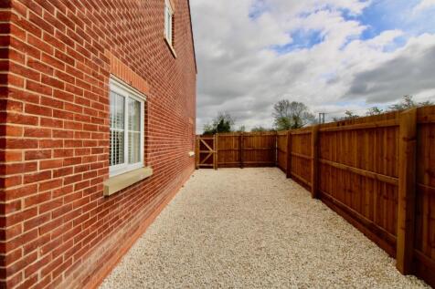 Area to the side of the property