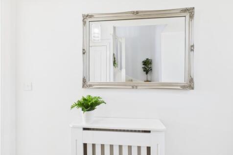 Tastefully decorated entrance hall to greet your g