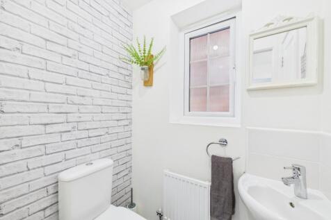 Practical and stylish this downstairs toilet also 