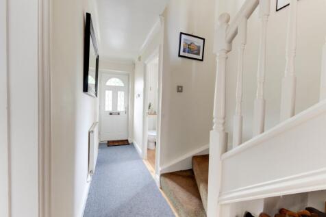 entrance hall and cloakroom view