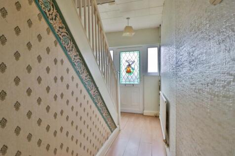 light hall with stained decorative glass door