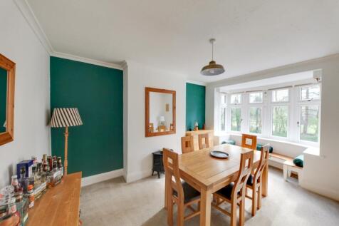 Large Dining room with window seating
