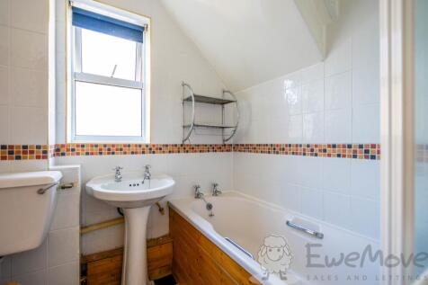 Bathroom with Electric Shower over Bath