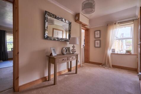 Natural light fills the landing creating an airy a