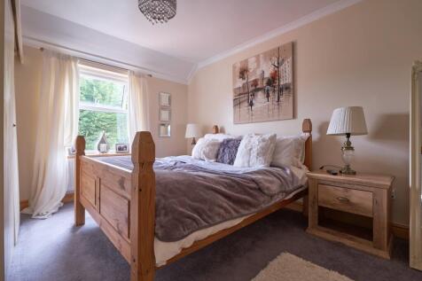 Embrace the comfort of a spacious double bedroom p