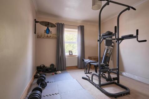 Discover Bedroom 4 in its current role as a gym sp