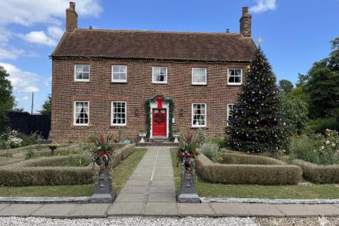 Barrow Hall farmhouse with xmas lights daytime