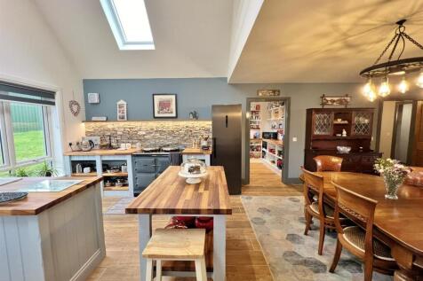 Kitchen showing dining area
