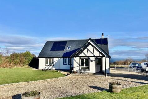 Rear of bungalow and view