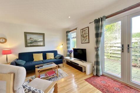 Open plan lounge showing French doors