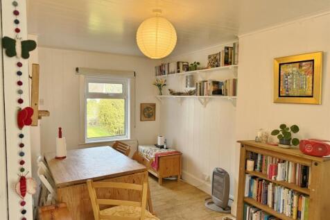 Living room to the front window